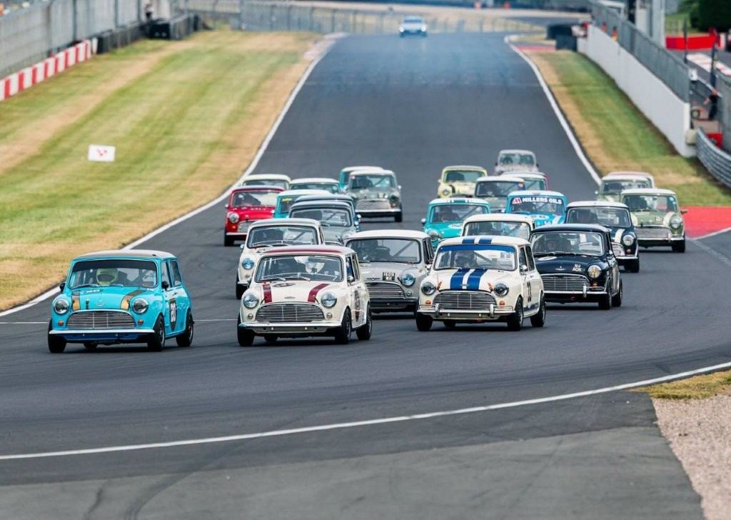 Classic Minis driving on a circuit